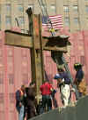 September 11, 2001 Mysteries - Crosses & Images - A cross stands in the ruins of the WTC towers, and startling and eerie images are seen in the photos and videos of the WTC smoke and fires. The September 11th 2001 terror attack on America news archive images, pictures, graphs, and photos are copyrighted.