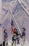 NYC Image  AP. New York fire Department raises US Flag in the rubble of the WTC.