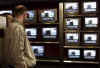 Click on the December 13th TV broadcast photo of the Osama bin Laden videotape for a larger image.