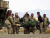 Click on the December 16th photo of injured U.S. marine for a larger image.