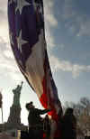 Click on the December 20, 2001 Liberty Island flag raising photo for a larger image.