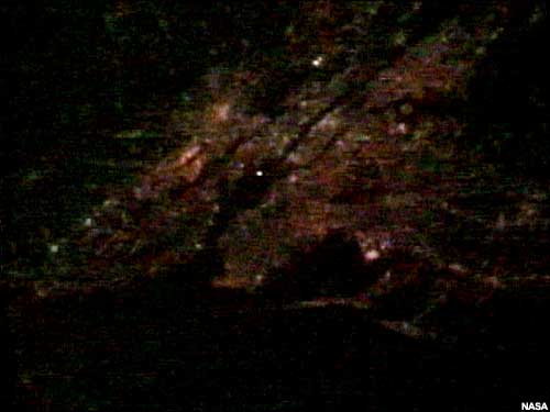 new york city at night from space. NASA / New York