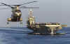 Click on the October 24th image of the USS Carl Vinson for a larger image.