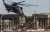 Click on the September 12, 2001 photo of the Pentagon for a larger image.