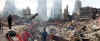 Click on the September 24th photo of a rescue worker at the WTC for a larger image.