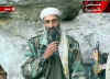 Click for a larger image. On October 7 Osama bin Laden makes a statement on Al-Jazeera TV.